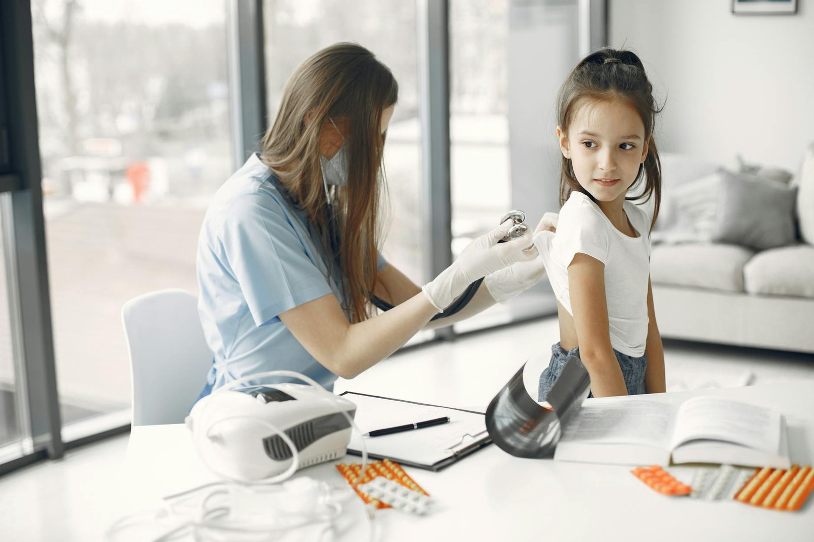 Young girl in clinic with doctor